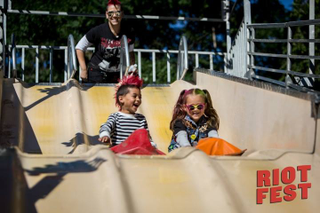 Carnival attractions offered fun for kids but made it harder to navigate the festival. (Photo: Riot Fest)